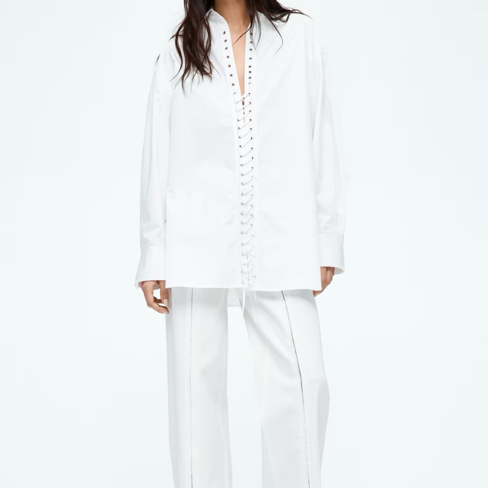 H&M Edition white lace up blouse.  Size medium.